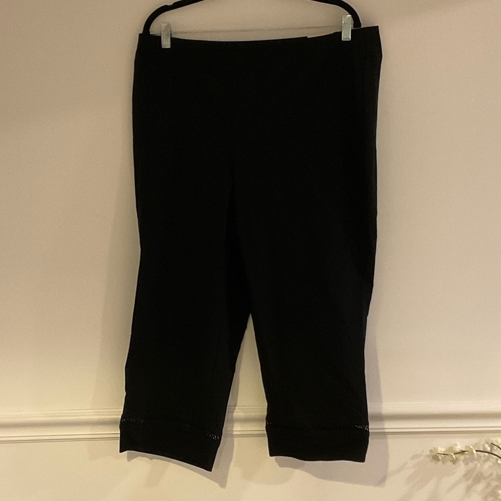 Black Cropped Pants. Eyelit trim on hemline